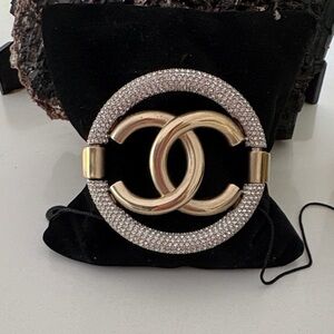 CHANEL Gold Interlocking CC Crystal Embellished Round cuff bracelet